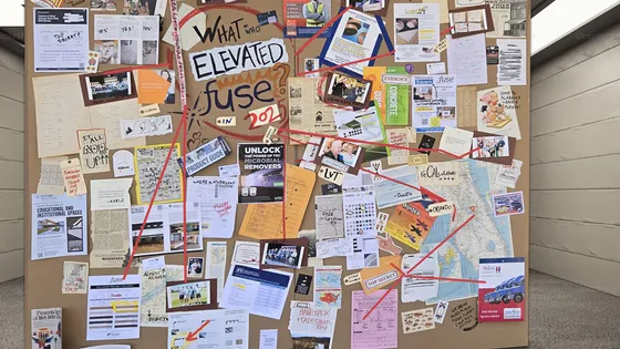 Investigation Board Example.  Man-Sized Cardboard Panels with evidence, maps, literature, and connecting words and yard crafting what looks to be a creative murder board, investigation board, or mystery solving device. 