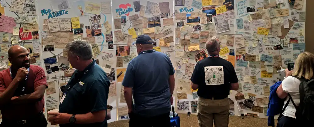 Admirers of an Investigation board design for a corporate conference.